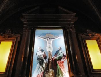 Low angle view of statue against building