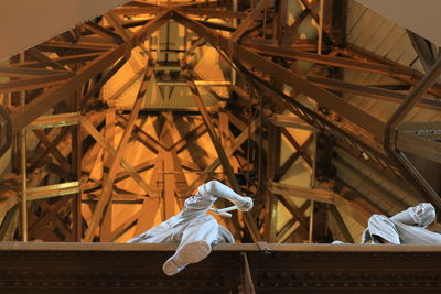 Low angle view of crane at construction site