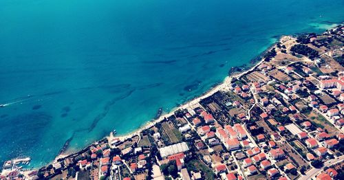 High angle view of city by sea