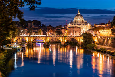 Reflection of illuminated buildings in water