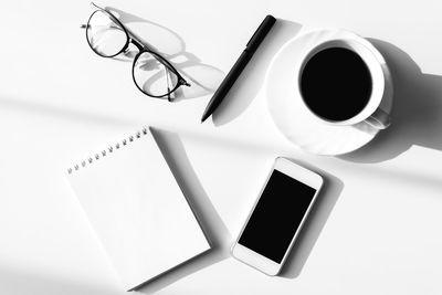 High angle view of coffee cup on table