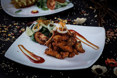 High angle view of serving food in plate