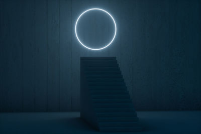 Illuminated electric lamp on staircase