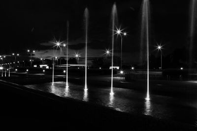 Illuminated street light at night