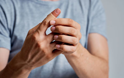 Midsection of woman with hands