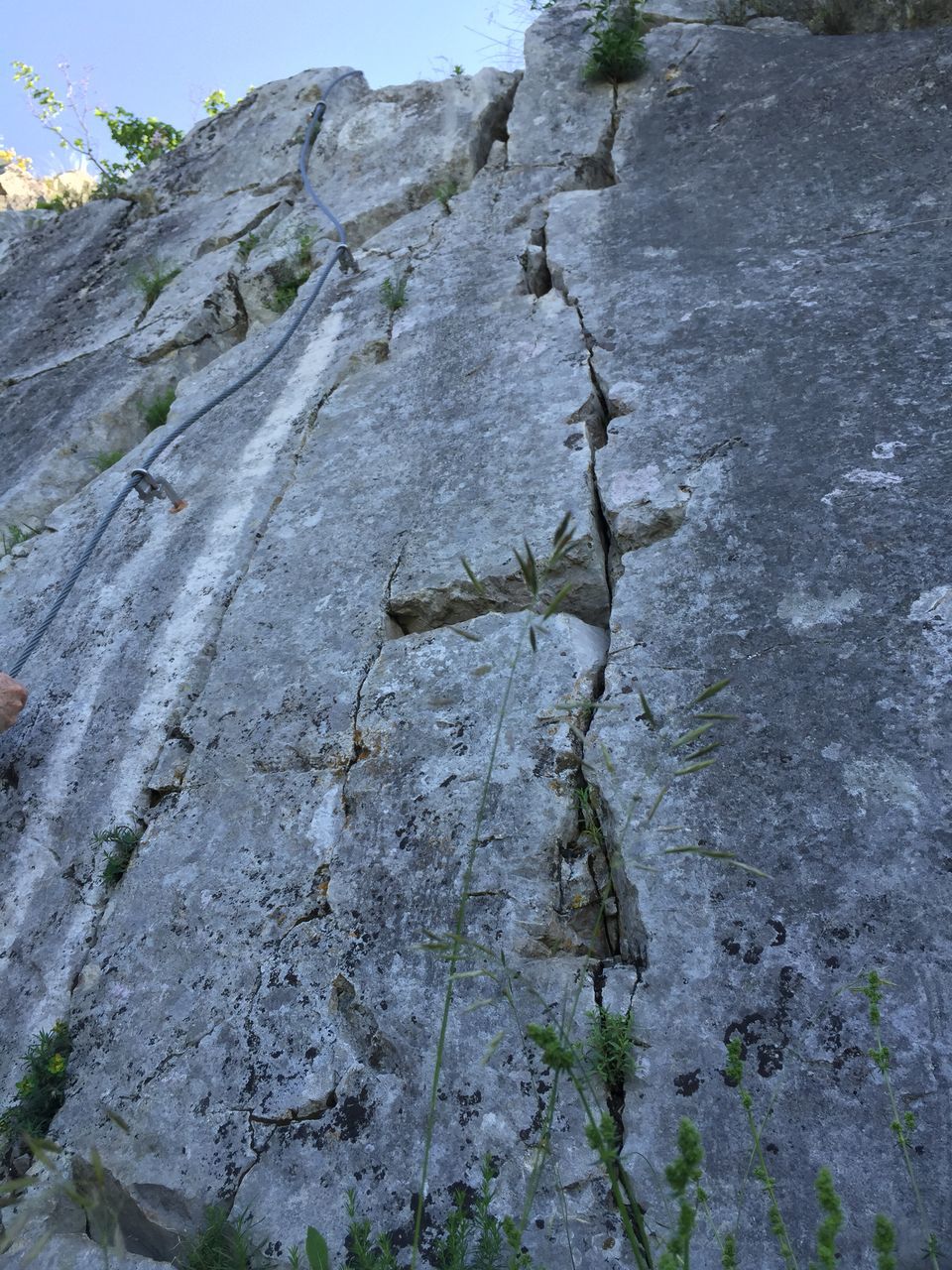 textured, weathered, rough, damaged, old, wall - building feature, close-up, deterioration, low angle view, run-down, built structure, architecture, outdoors, wall, day, cracked, no people, backgrounds, full frame, stone wall