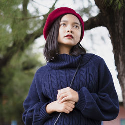 Portrait of a beautiful young woman in winter