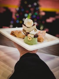 Midsection of person holding ice cream