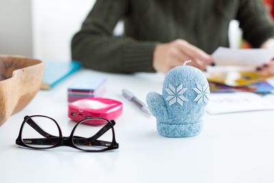 Midsection of businesswoman working in office