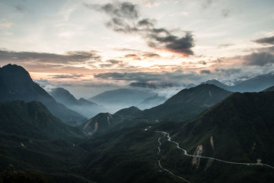 Scenic view of mountains against sky during sunset