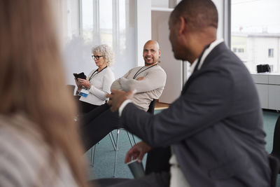 Smiling businessman during meeting