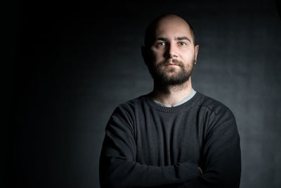 Portrait of man looking at camera