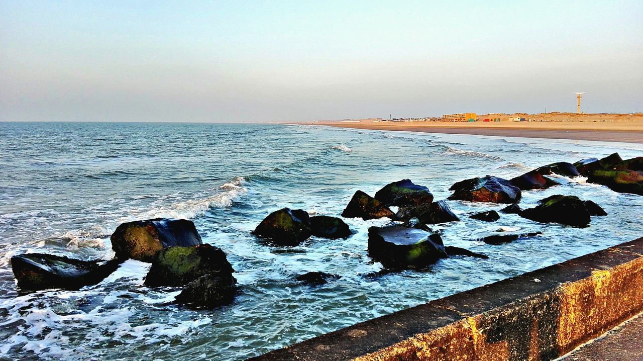 sea, water, horizon over water, nature, beach, beauty in nature, sky, outdoors, scenics, day, tranquility, sunset, no people