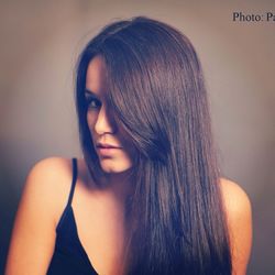 Close-up portrait of young woman