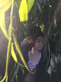 Close-up of girl wearing plant