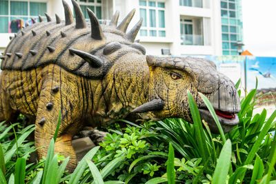 Close-up of animal statue on grass