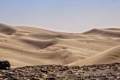 Scenic view of desert against clear sky