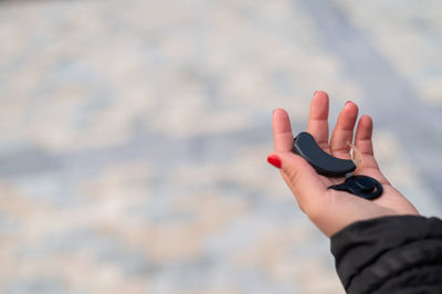 Close-up of person holding hands