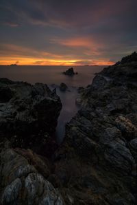 Scenic view of sea against sky during sunset