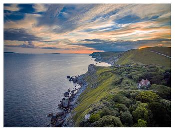 Scenic view of sea at sunset