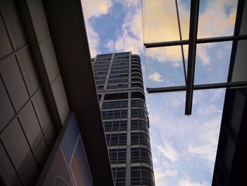 Low angle view of modern building against sky