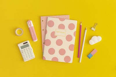 School stationery on a yellow background. top view with copy space. flat lay. back to school 