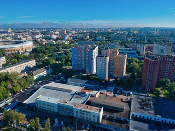 High angle view of buildings in city against sky