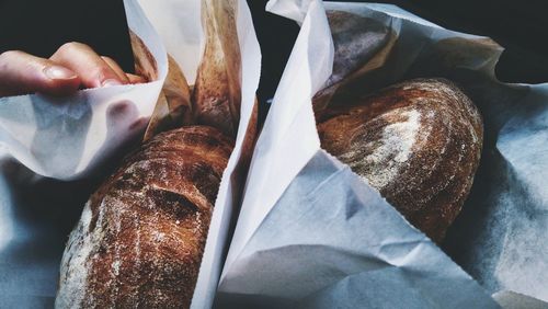 High angle view of fresh bread on paper