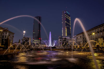 Illuminated city at night