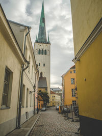 View of buildings in city against sky