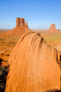 Scenic view of desert against clear sky