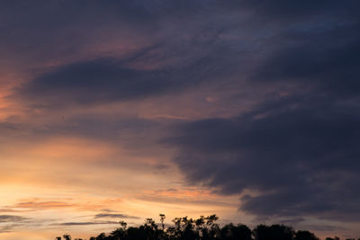 Low angle view of dramatic sky during sunset