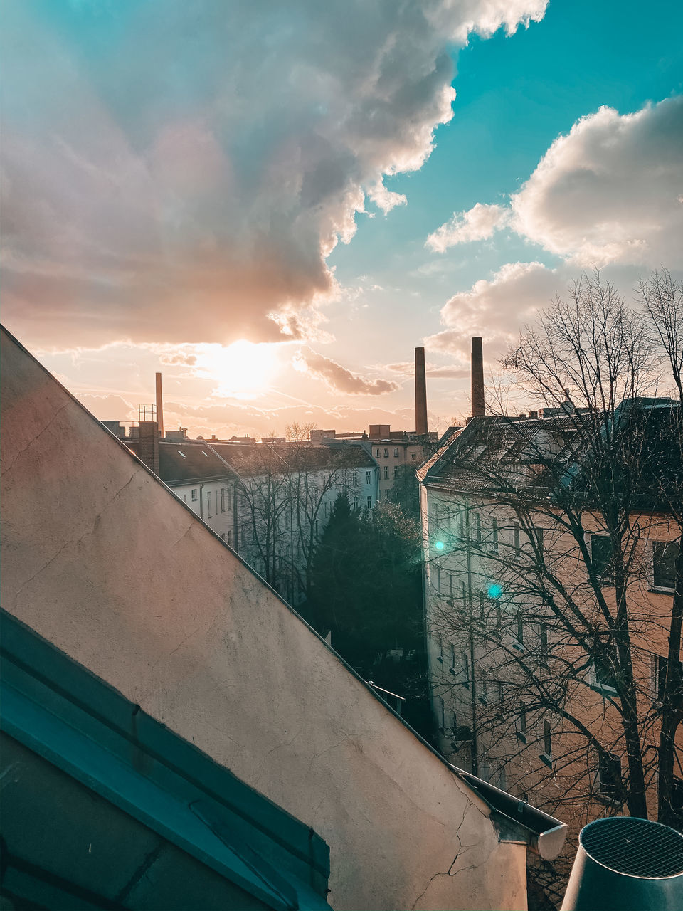 BUILDINGS AGAINST SKY DURING SUNSET