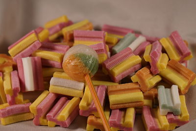 Close-up of multi colored bubble gum and lollipops. sweets