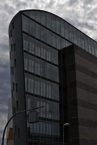 Low angle view of modern building against sky