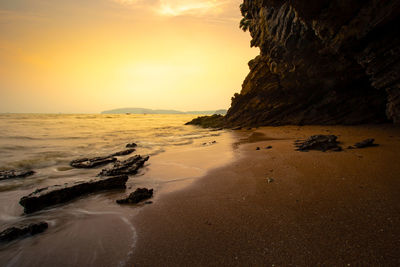 Sunset at phra nang beach, krabi province, thailand.
