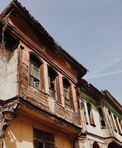 Low angle view of old building against sky