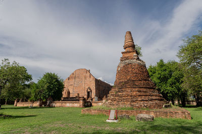 View of temple against cloudy sky