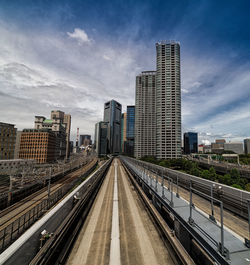 Railroad between buildings in tokyo city 