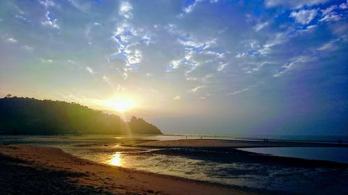 Scenic view of sea against sky at sunset