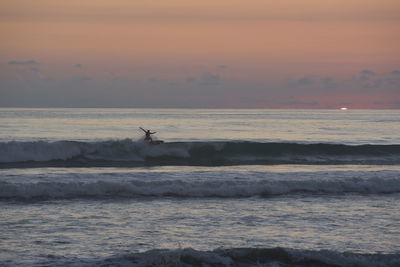 Scenic view of sea at sunset