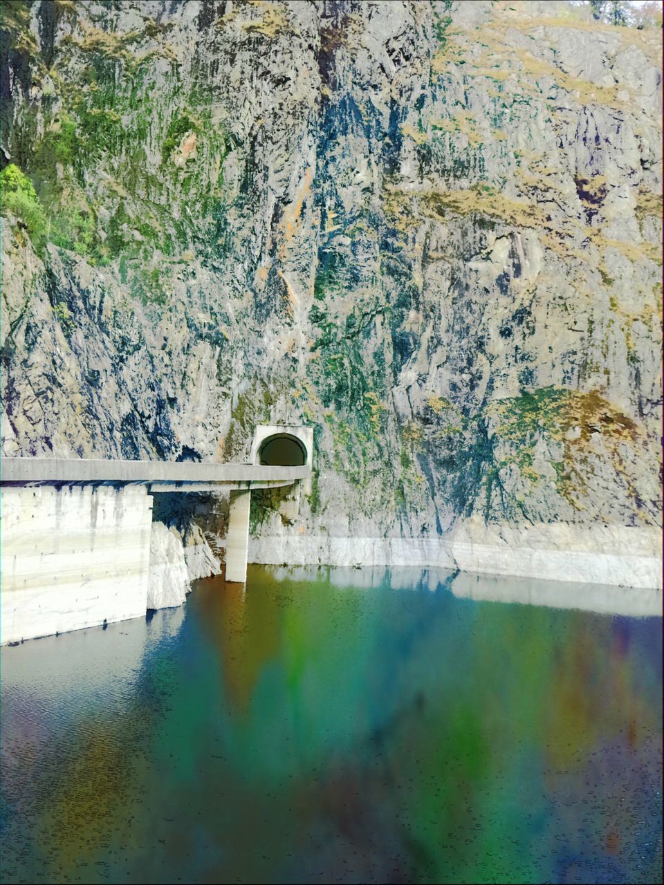 BRIDGE OVER SWIMMING POOL BY RIVER