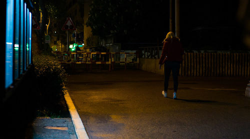 Man on road at night