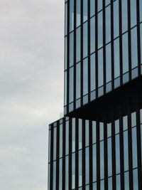 Low angle view of modern building against sky