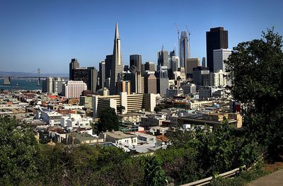 View of cityscape against clear sky