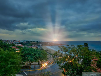 Scenic view of sea against sky at sunset