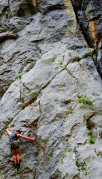 Woman standing on rock