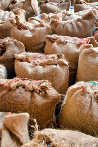 Sacks of unroasted coffee on the way to the roasting plant