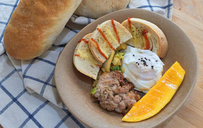 High angle view of breakfast served on table