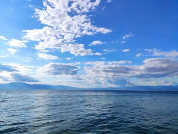 Scenic view of sea against blue sky